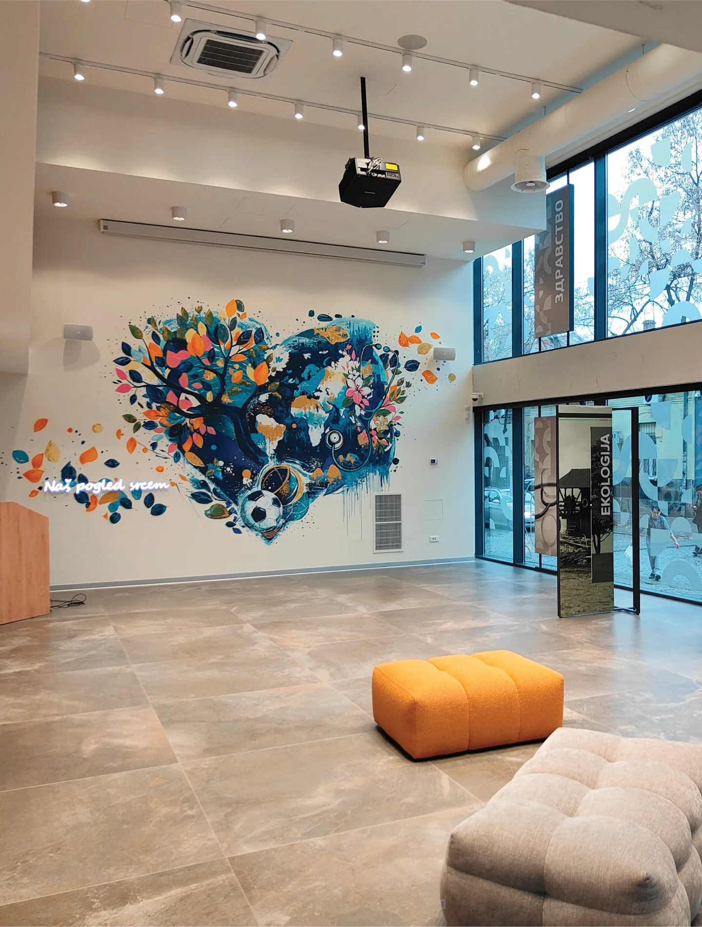 Wide view of the Mozzart Foundation gallery and its colourful central mural.