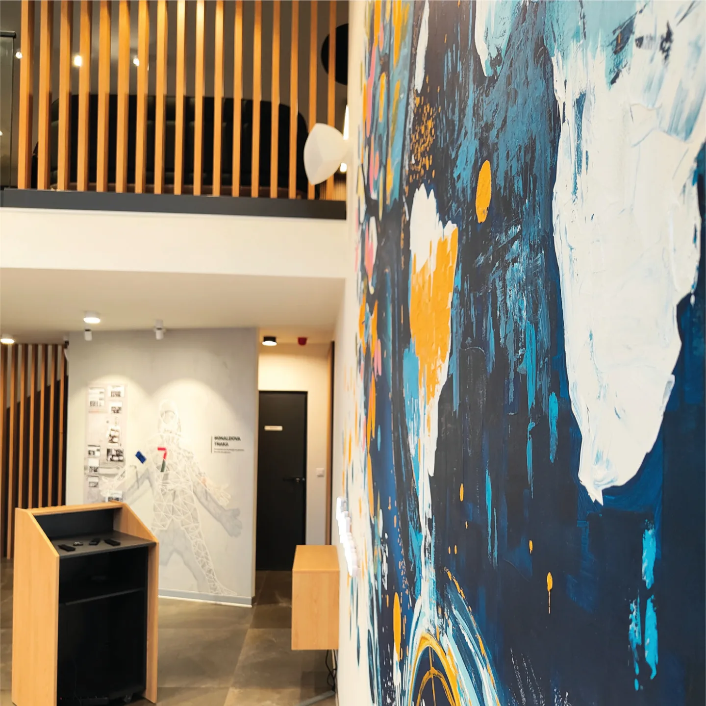 Side view of the mural beside the gallery entrance.