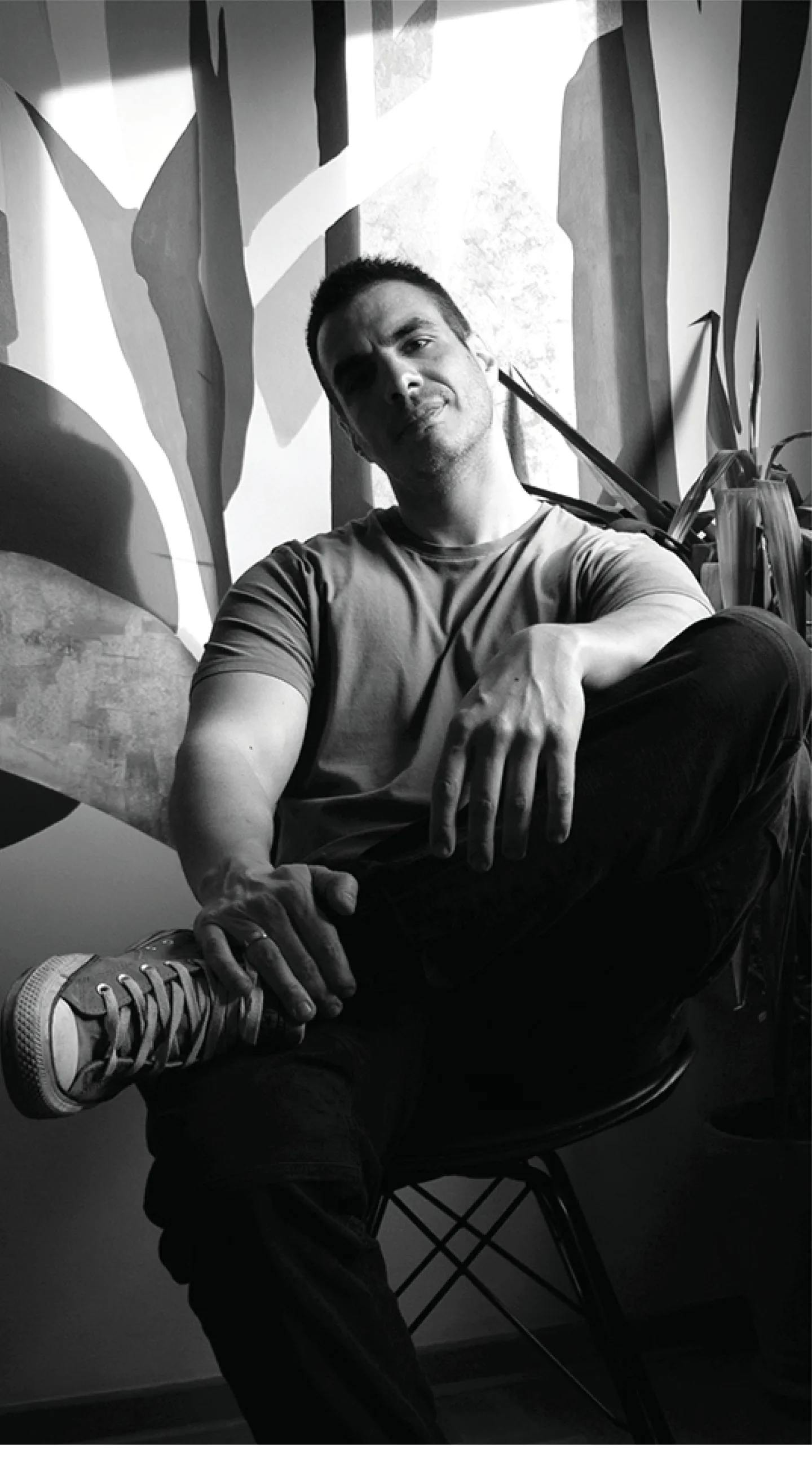 Black and white portrait of mural artist Ognjan Dzevrnja.