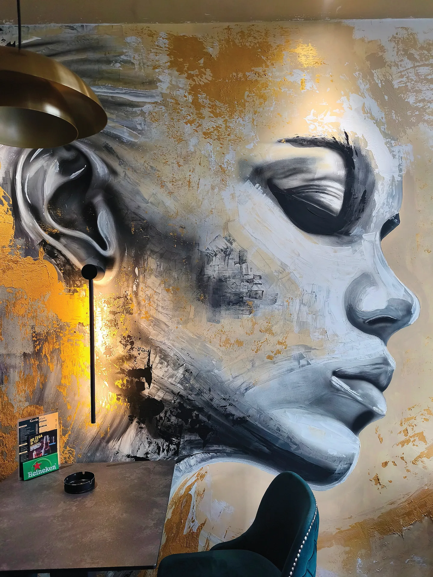 Close-up of the painted face in the Bellucci mural.