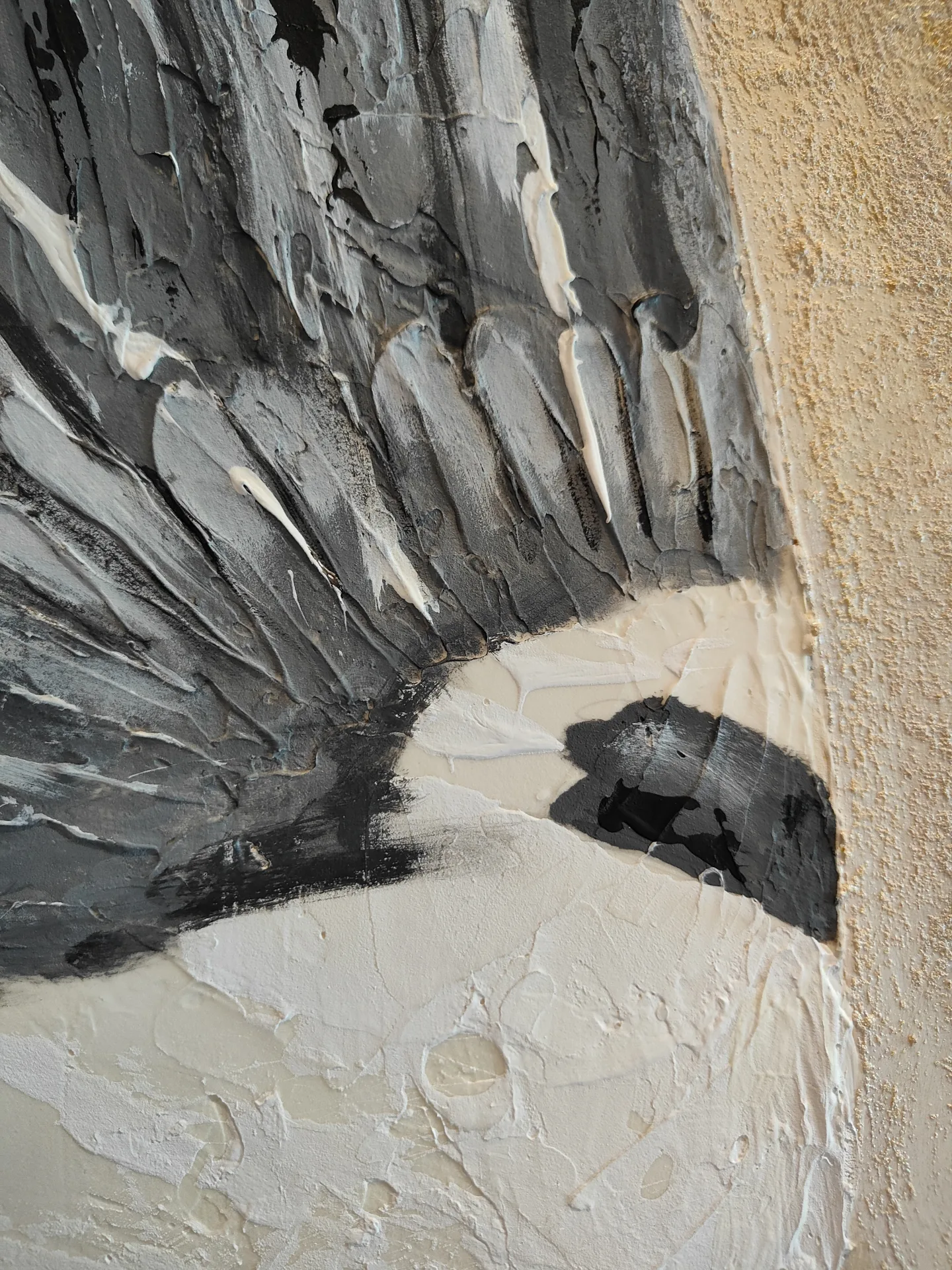 Detail of the stork’s head and outstretched wing.